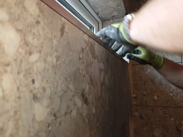 Finishing the edge of the tiled window reveal